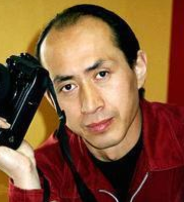 梁达明