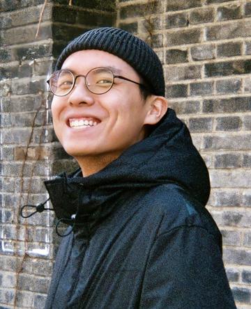 何坦